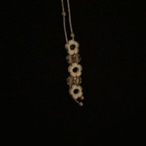 Sterling silver necklace stamped w/ flowers